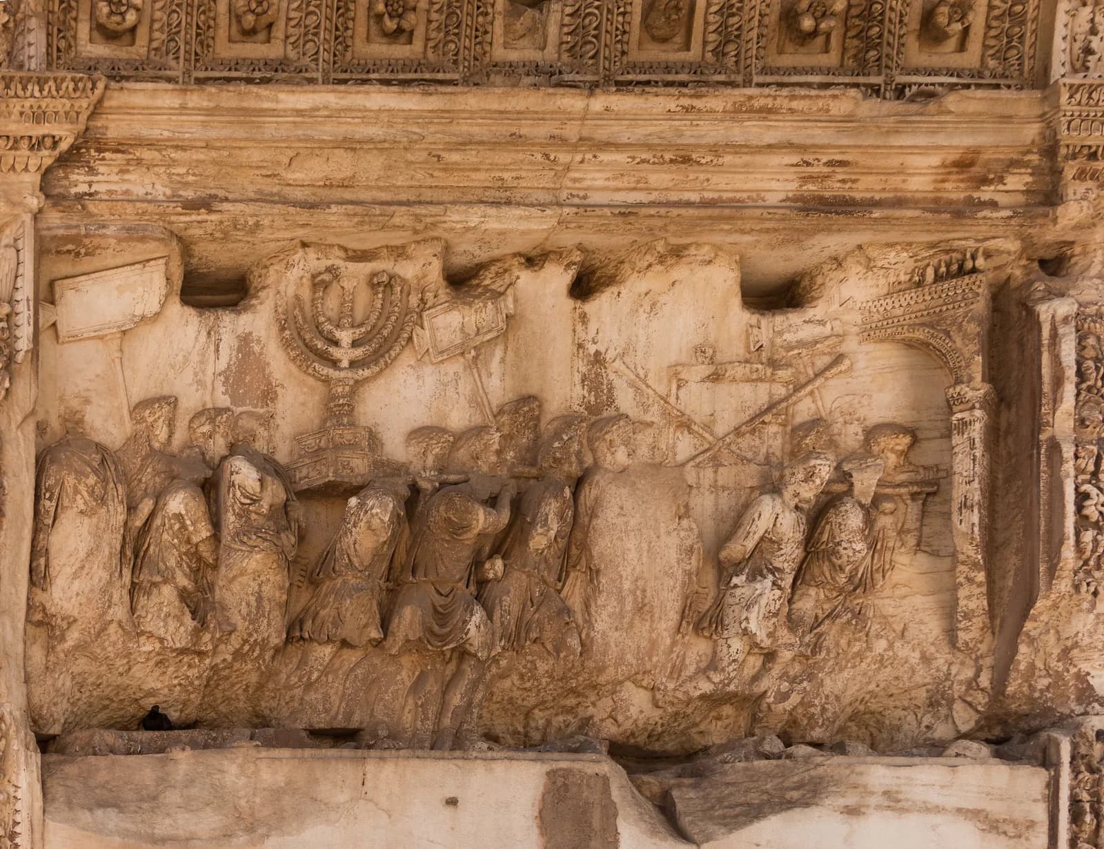 Reliefs in the bay of the Arch of Titus on the Via Sacra in the Forum Romanum, c. 81 CE — the triumphal panels commemorating the Jewish War of 70 CE.