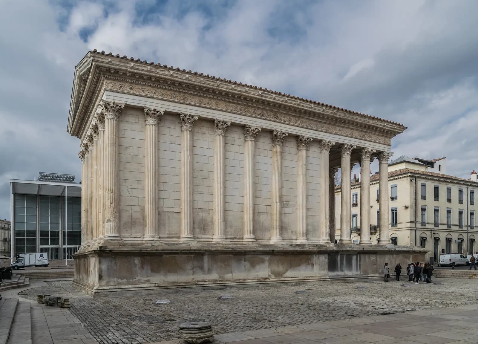 The Maison Carrée at Nîmes, an exceptionally well-preserved Roman temple of the Augustan period — a hexastyle Corinthian temple originally dedicated to Gaius and Lucius Caesar, the grandsons and intended heirs of Augustus.